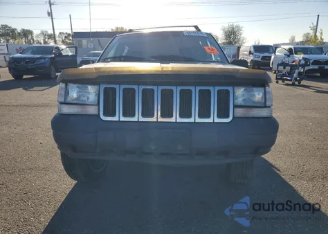 1996 Jeep Grand Cherokee Laredo z USA, uszkodzony, nr VIN 1J4GZ58S4TC213568